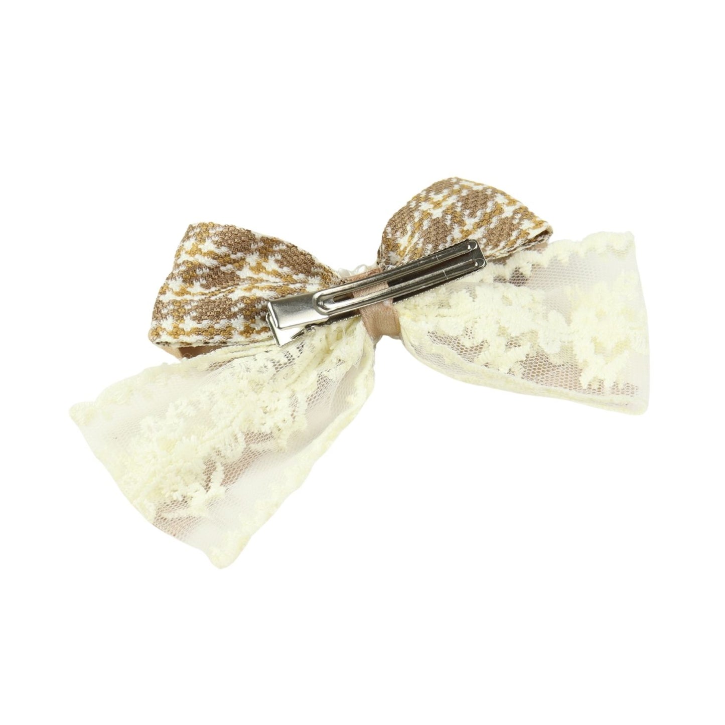 Close-up of the floral charm on the bow on the brown clip
