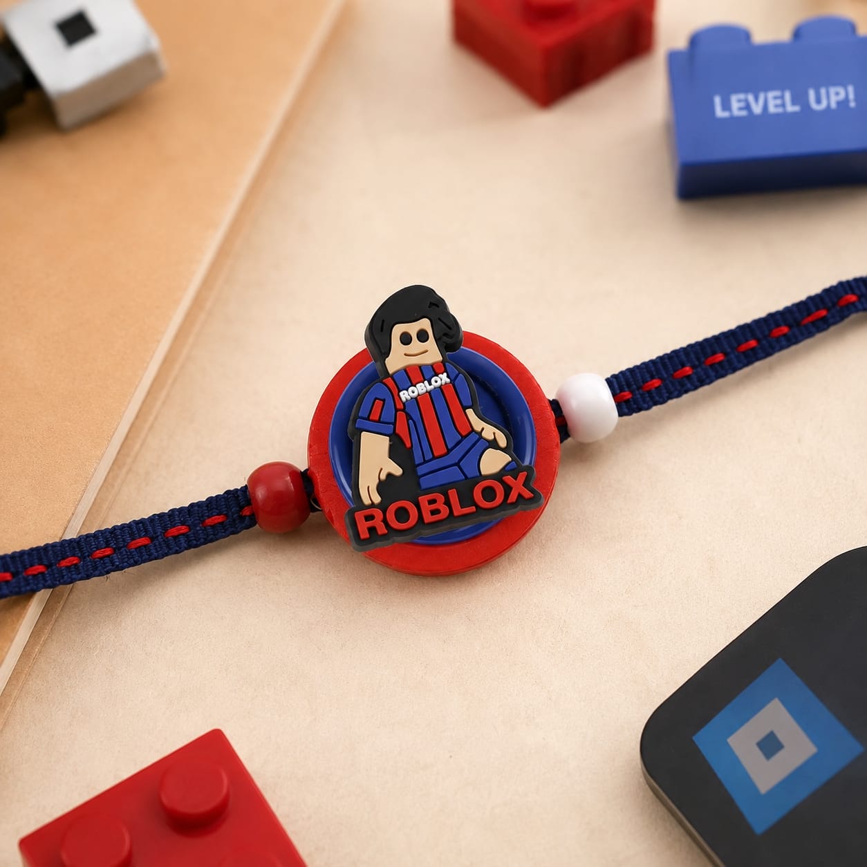Gamer tie-up Rakhi, laid flat