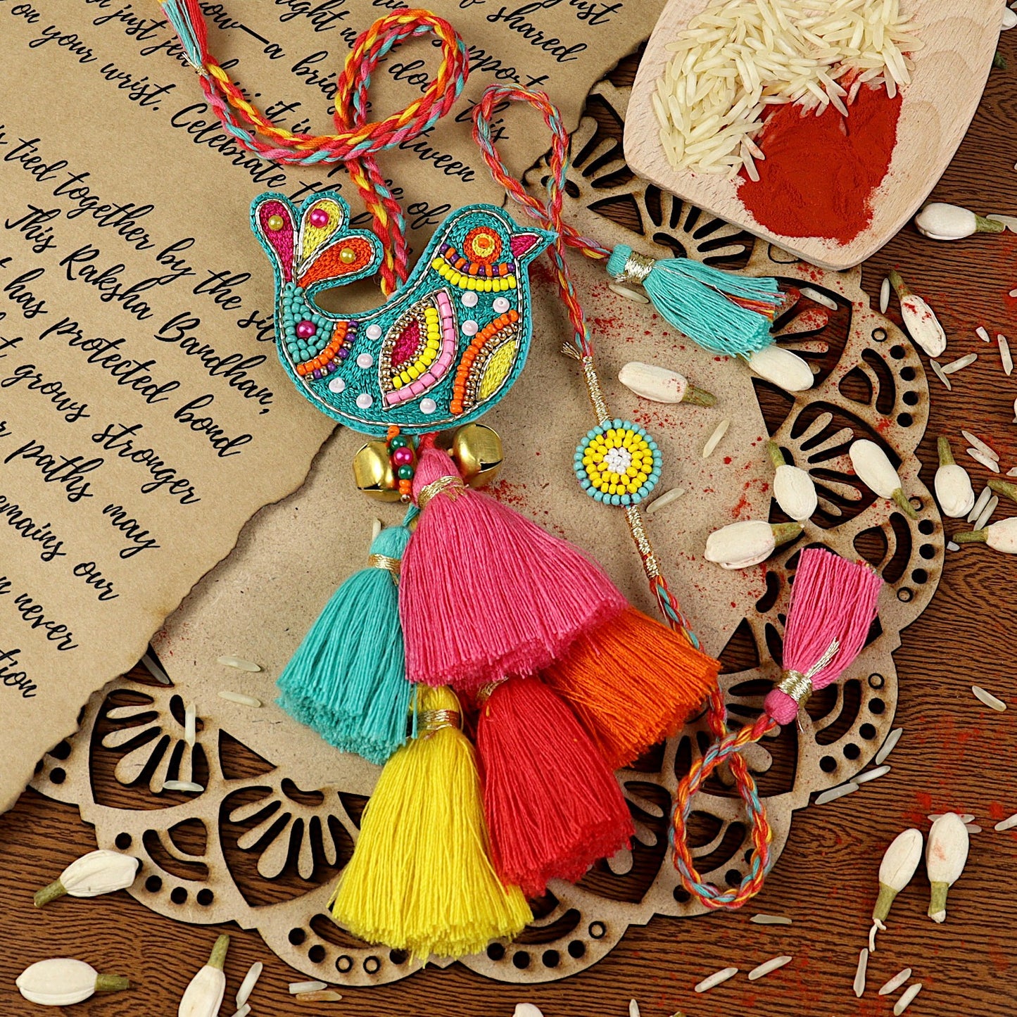 Beaded Bird Bhai Bhabhi Rakhi pair — Rakhi and Lumba laid flat