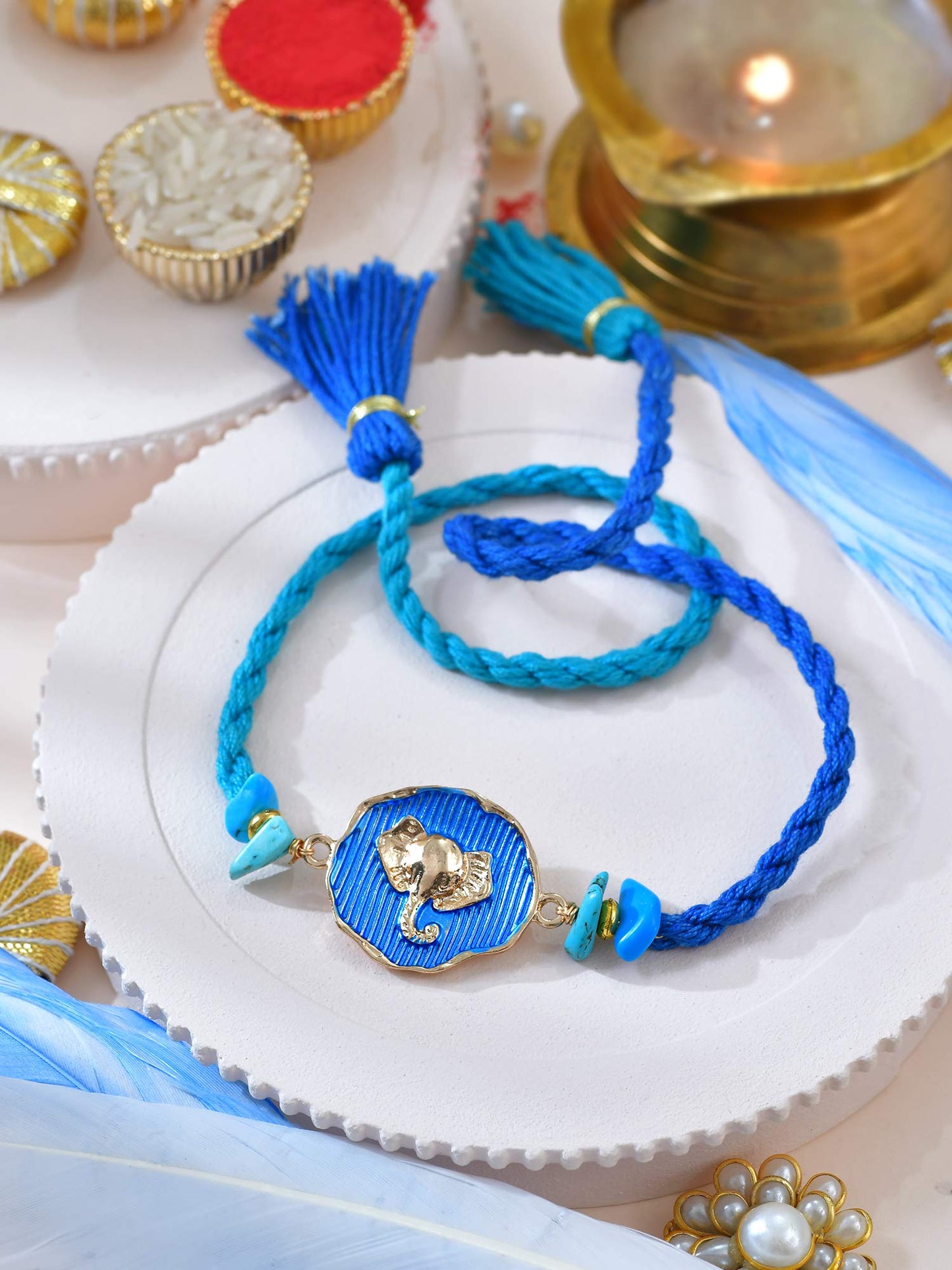 Elephant metal charm Rakhi with fancy tassel on a thread cord