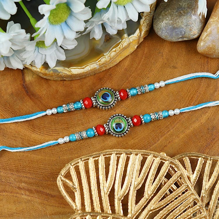 Set of 2 Peacock Feather Rakhis – Designer Rakhi by Asthetika for Raksha Bandhan