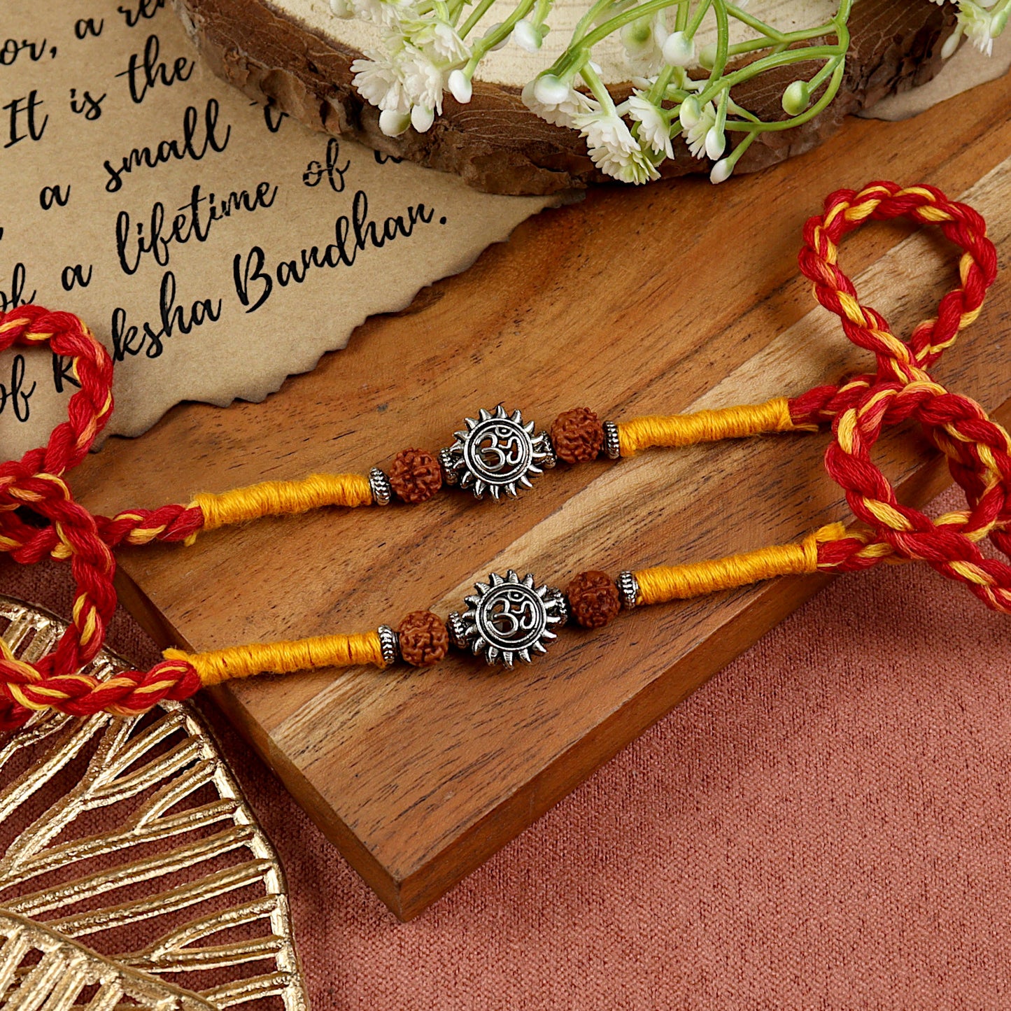 Oxidised Om Rudraksh Rakhi, laid flat