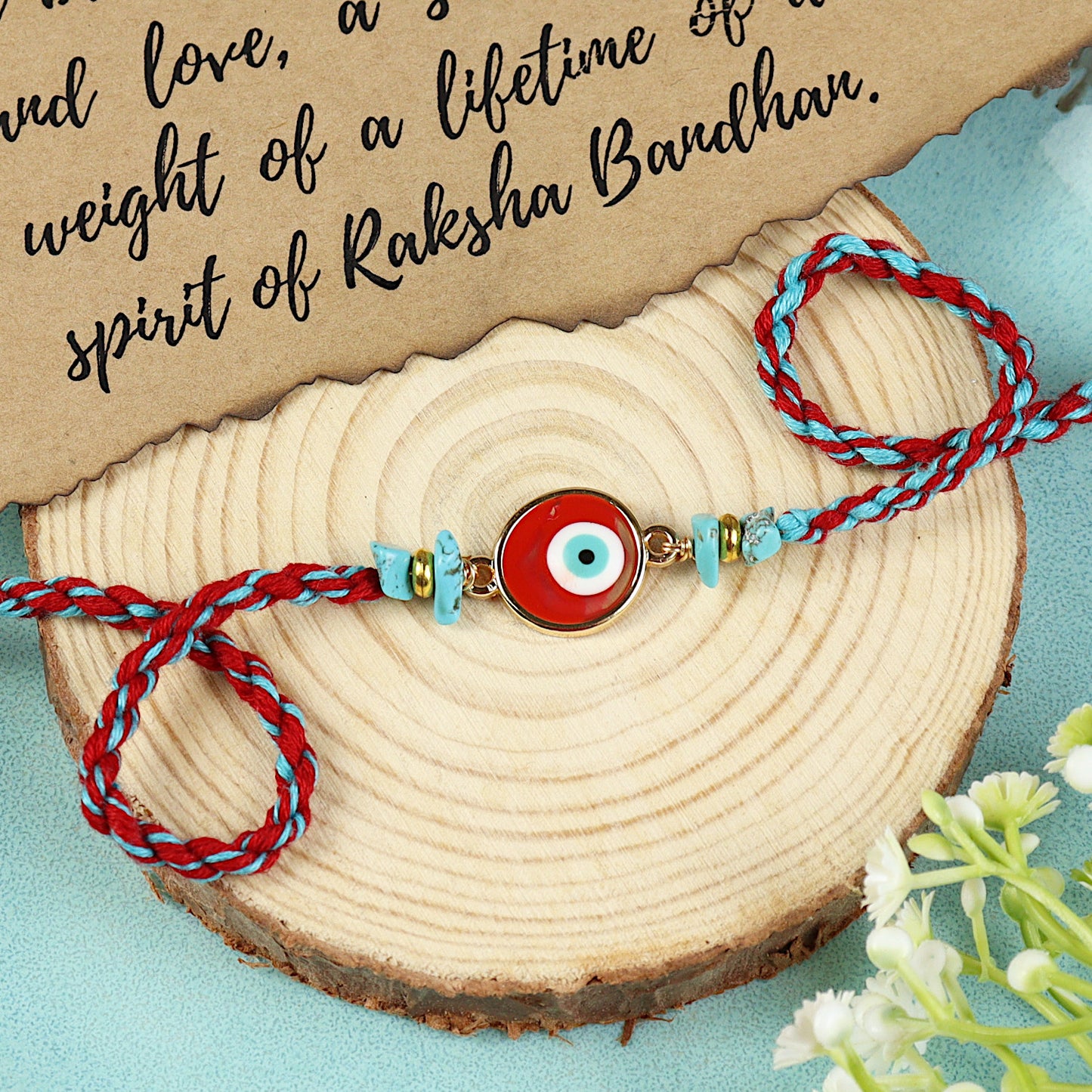 Red Stone Evil Eye Rakhi, laid flat