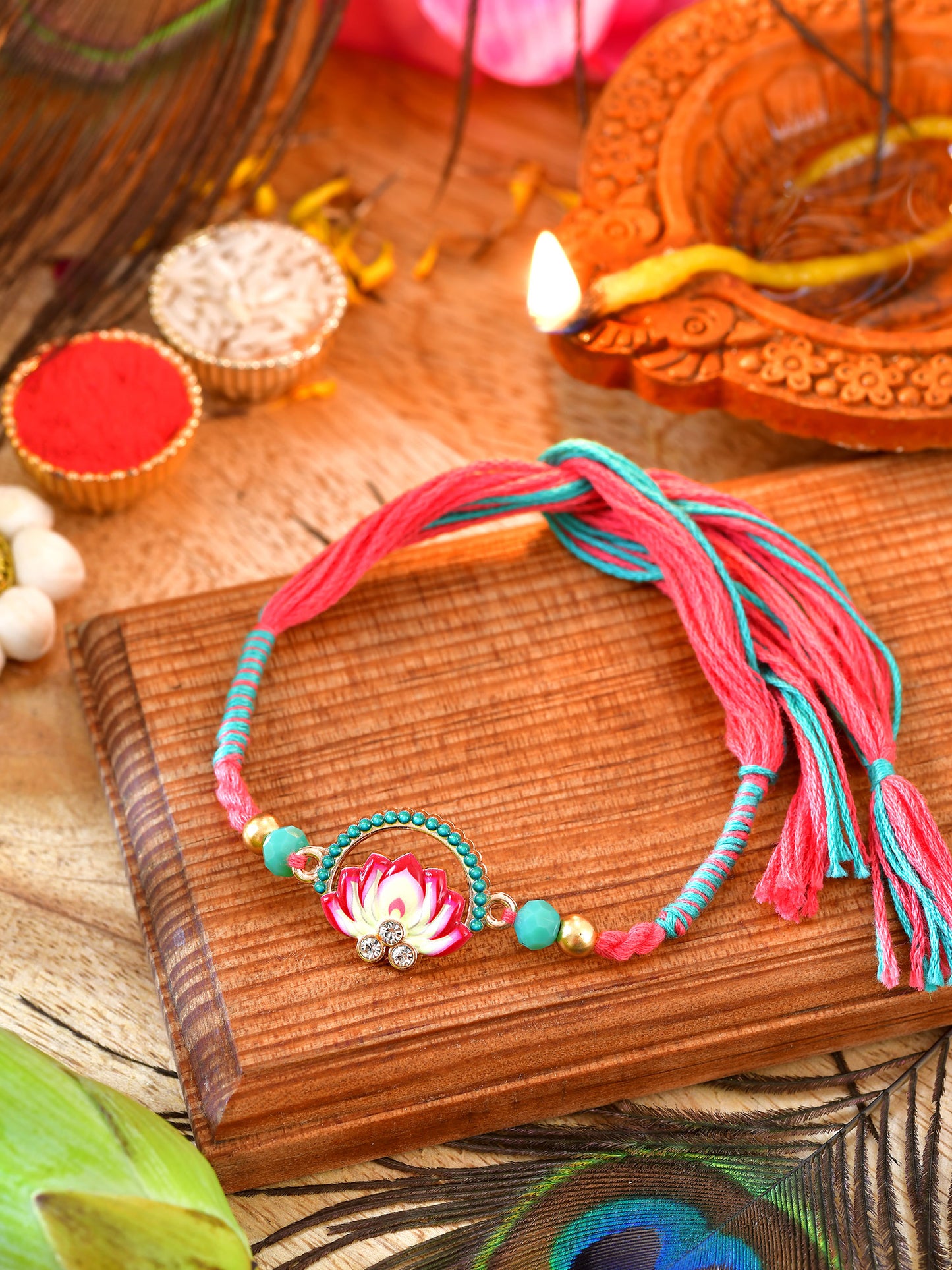 Lotus weaved thread Rakhi with lotus stone on a weaved thread cord