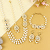 Kundan jewellery set for girls in gold-toned base, laid flat