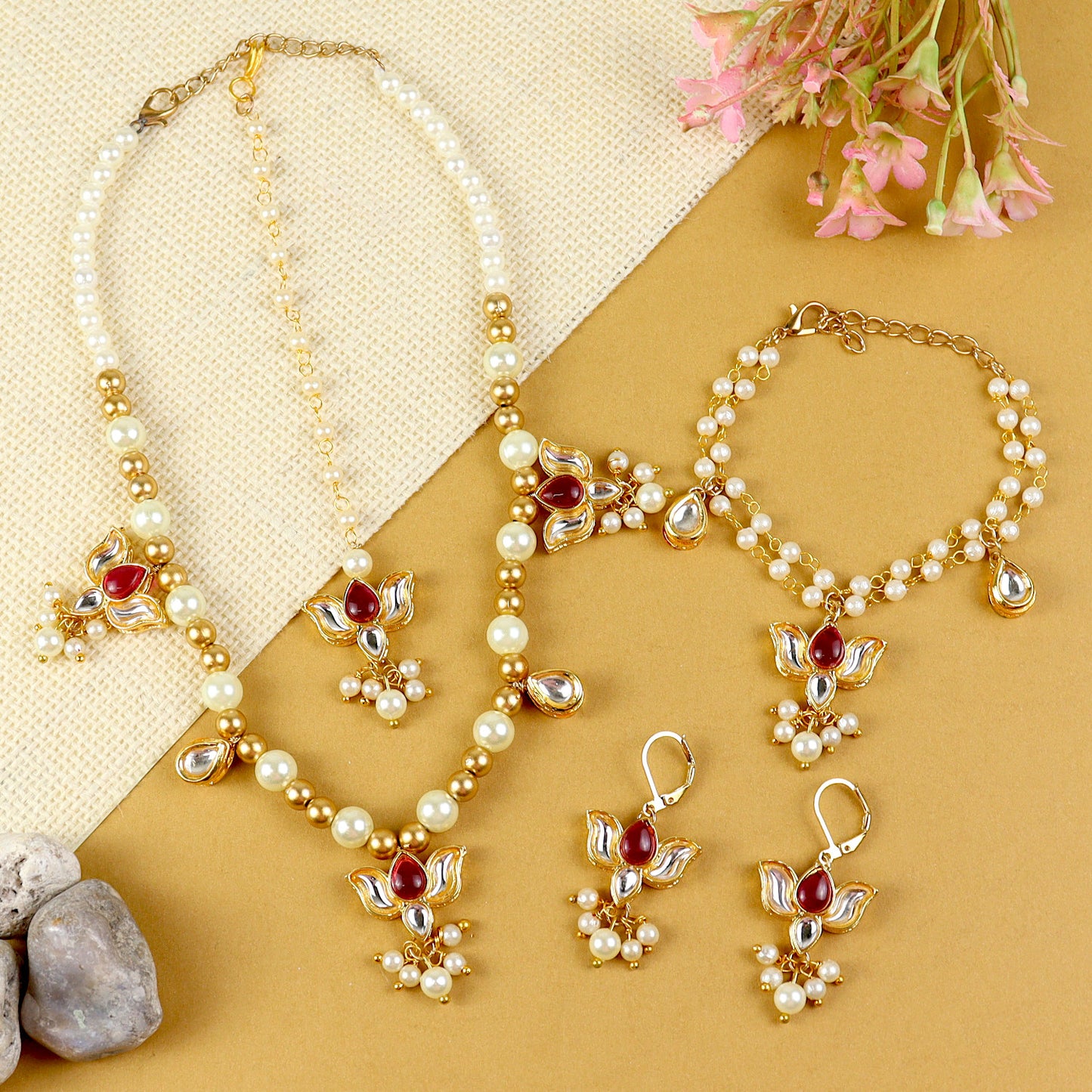 Kundan Lotus jewellery set for girls in gold-toned base, laid flat