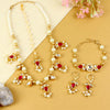Kundan jewellery set for girls in gold-toned base, laid flat
