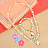 Unicorn jewellery set, necklace and bracelet laid flat