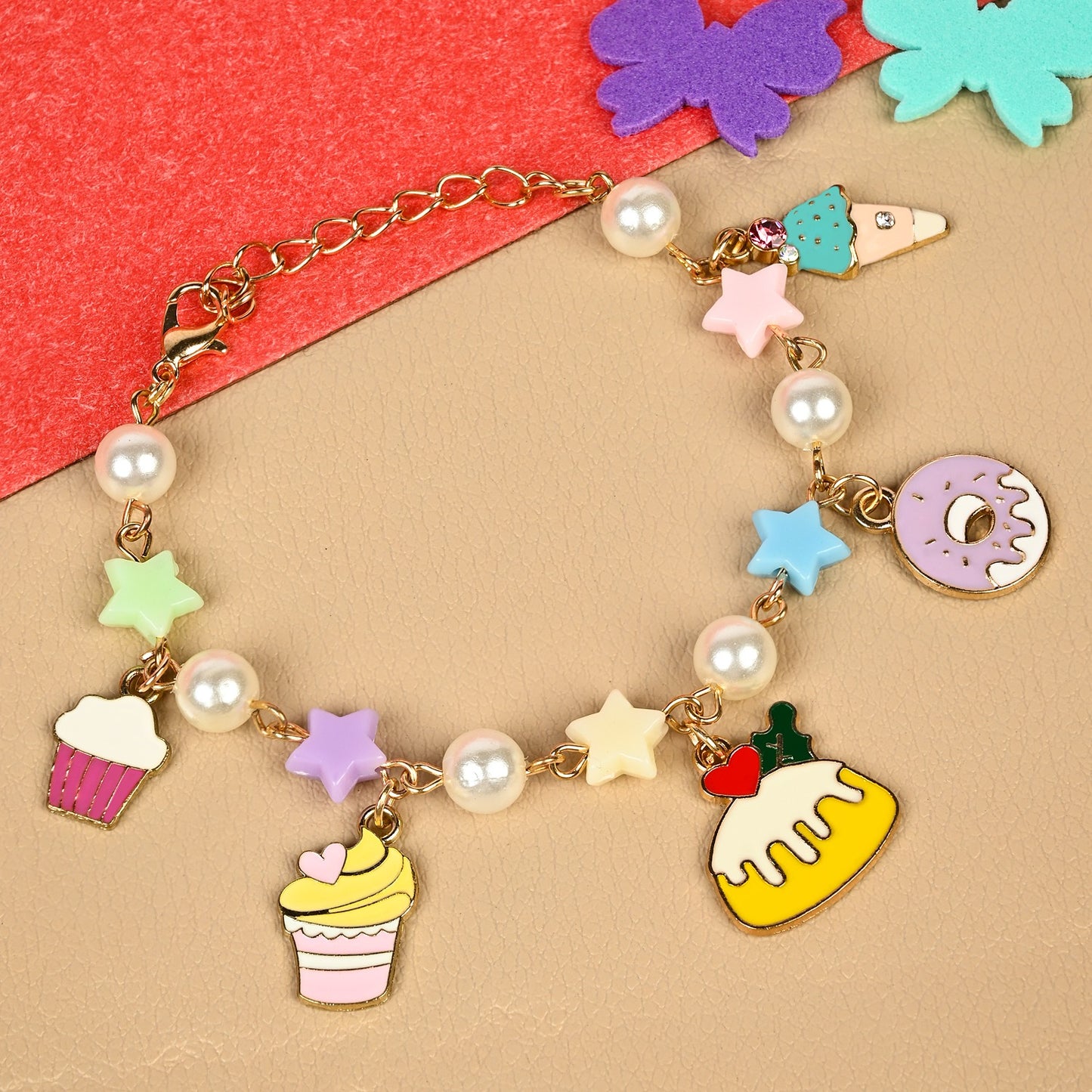 Cake donut charm chain bracelet, laid flat