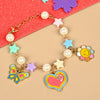 Butterfly heart charm chain bracelet, laid flat