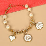 Heart charm chain bracelet, laid flat