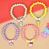 Set of 4 an ice-cream or donut charm beaded bracelets, laid flat