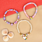 Set of 3 heart star Fimo bead bracelets, laid flat