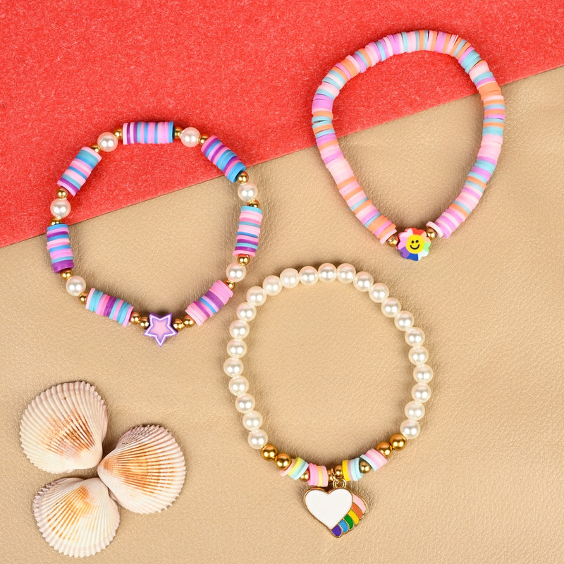Set of 3 heart star Fimo bead bracelets, laid flat