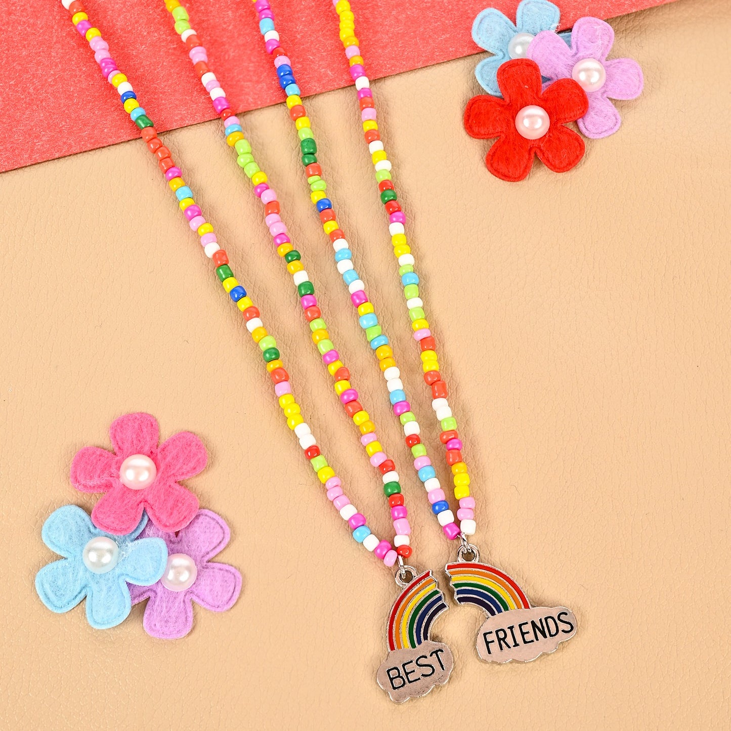 Set of 2 "Best Friends" charm necklaces, laid flat