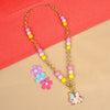 Unicorn charm necklace, laid flat