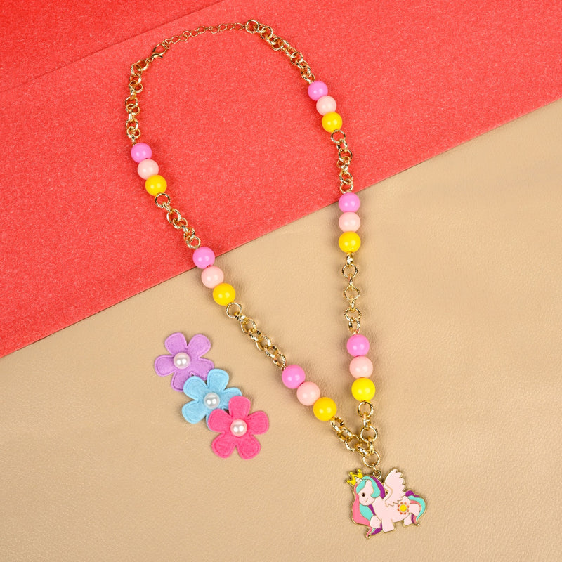 Unicorn charm necklace, laid flat