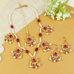 Kundan jewellery set for girls in gold-toned base, laid flat