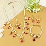 Kundan Lotus jewellery set for girls — necklace, earrings, maang tikka, and bracelet, laid flat
