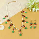 Kundan jewellery set for girls in gold-toned base, laid flat