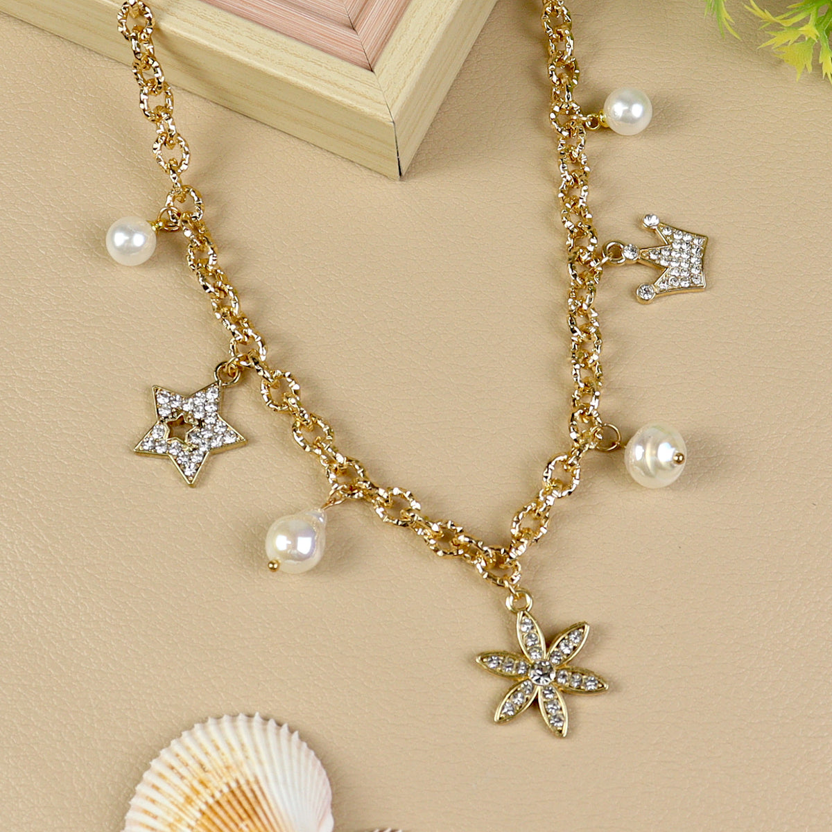 Multi Charm necklace for girls in metal charms, laid flat