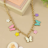 Butterfly Charm necklace for girls in metal charms, laid flat