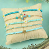 Set of 5 multi charm bracelets for girls, laid flat