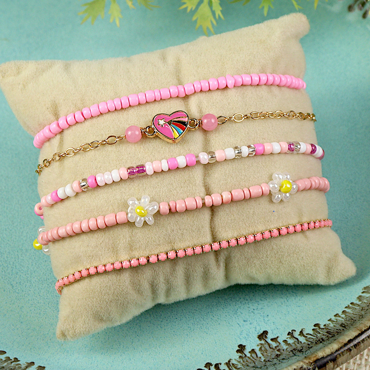 Set of 5 heart charm bracelets for girls, laid flat