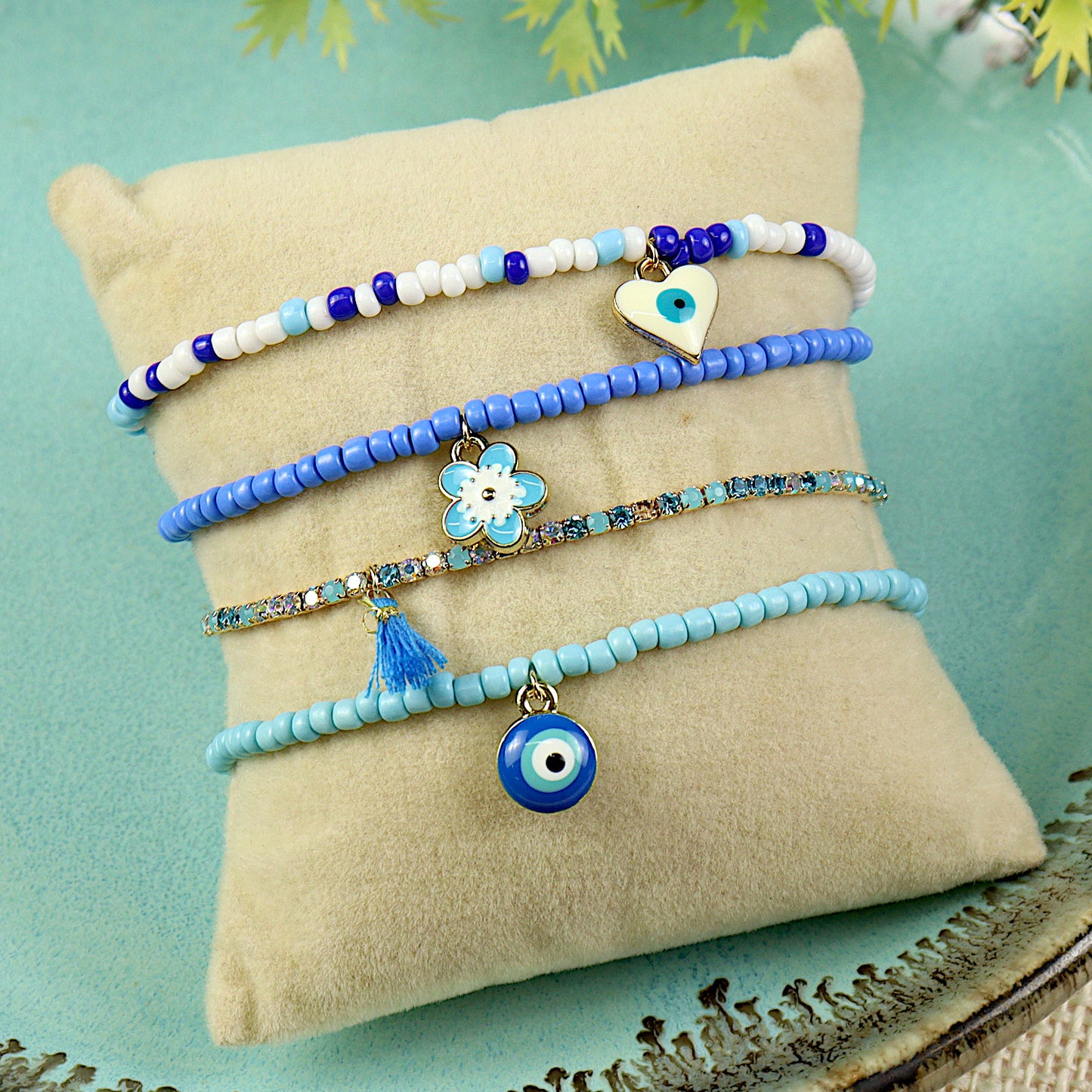 Set of 4 evil eye bracelets for girls, laid flat