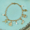 Multi Sea Charms bracelet for girls in metal charms, laid flat