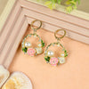 Floral Charm earrings for girls in metal charms, laid flat