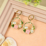 Floral Charm earrings for girls in metal charms, laid flat
