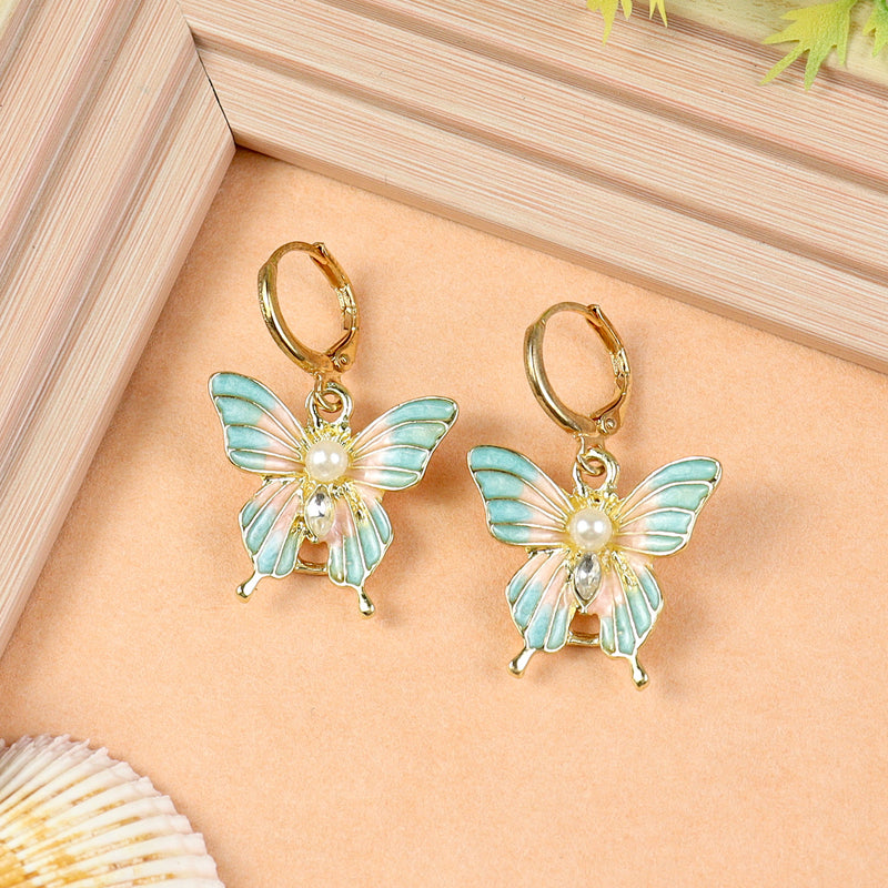 Butterfly Charm earrings for girls in metal charms, laid flat