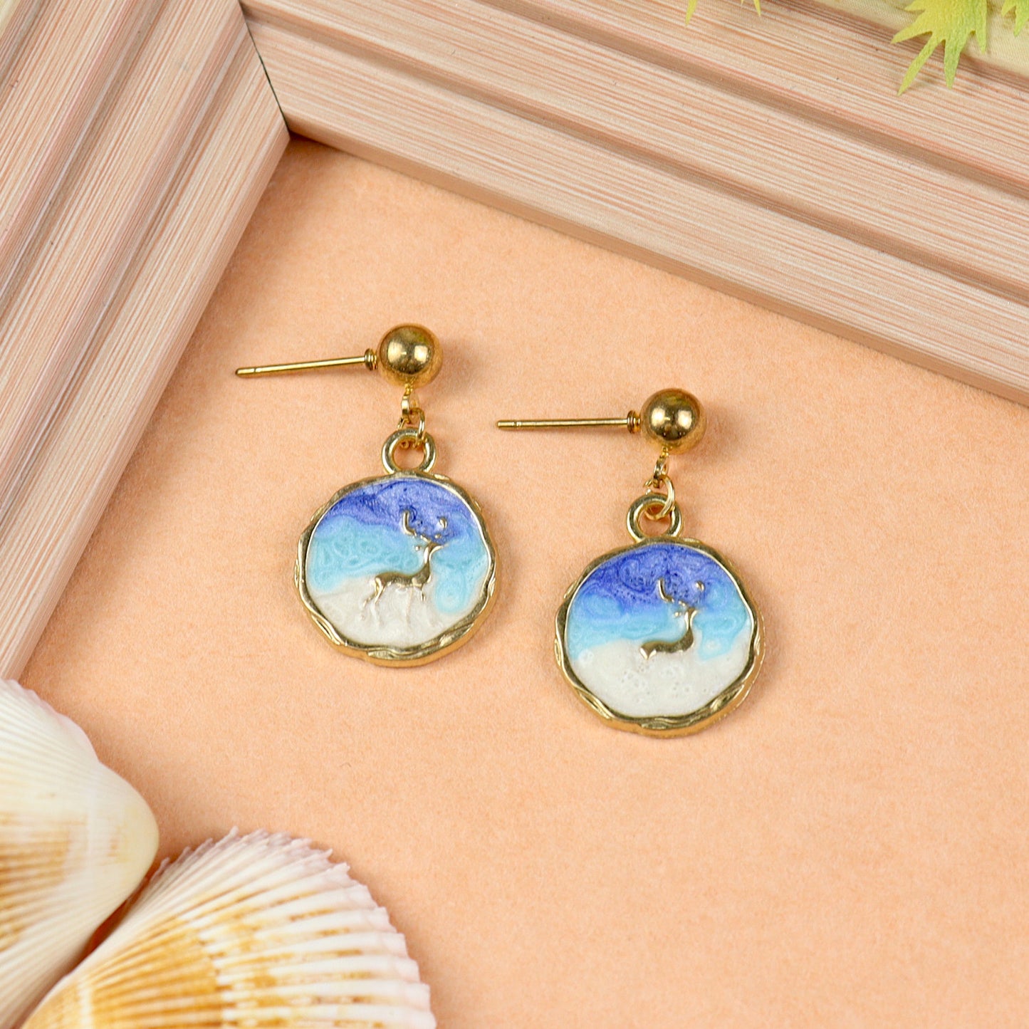Starlight Drop earrings for girls in metal charms, laid flat