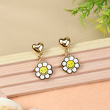 Smiley Charm earrings for girls in metal charms, laid flat