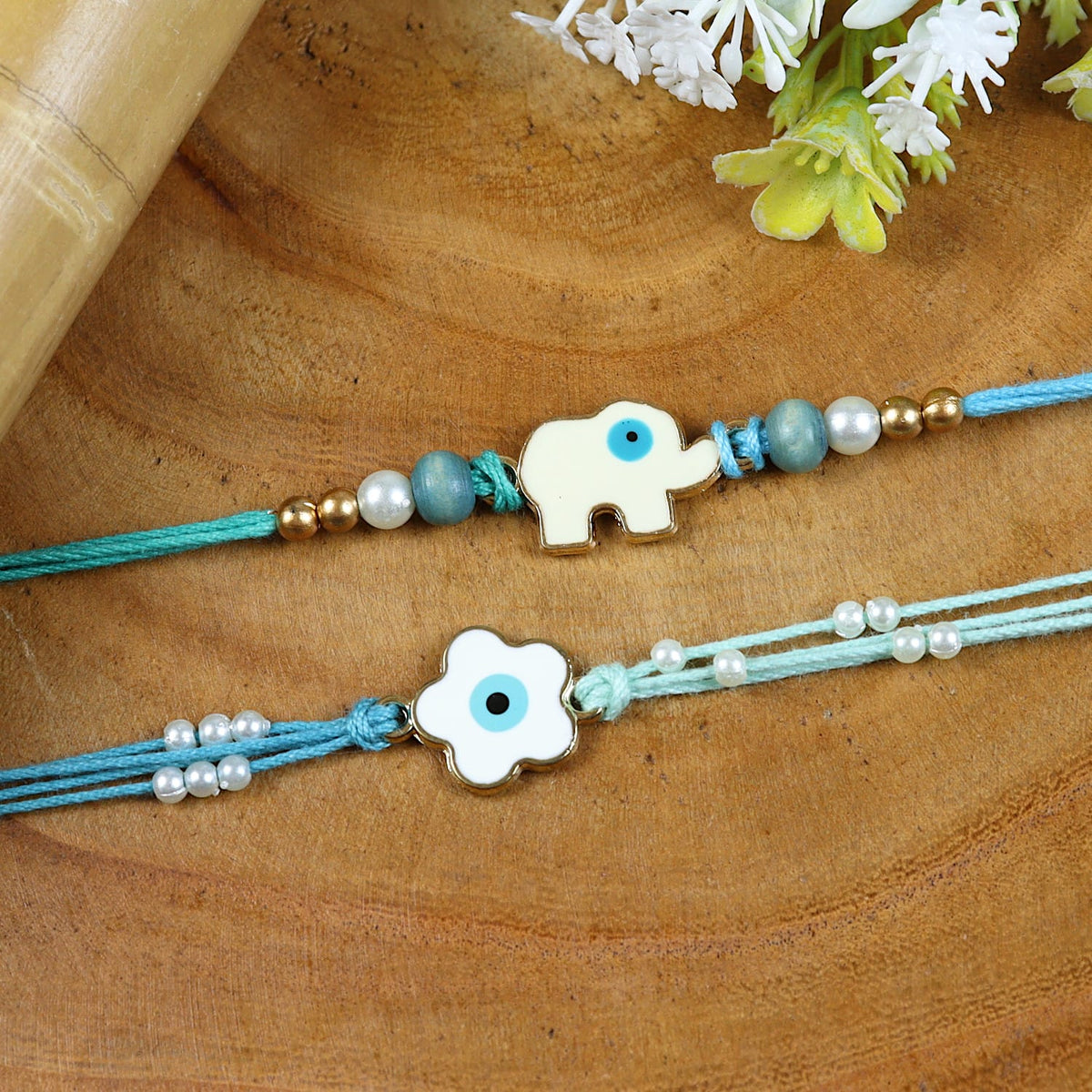 Evil Eye Elephant and Flower Set of 2 Rakhis in Greeting Card with Roli Chawal