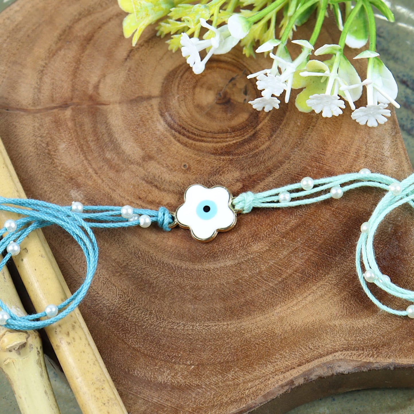 Evil Eye Elephant and Flower Set of 2 Rakhis in Greeting Card with Roli Chawal