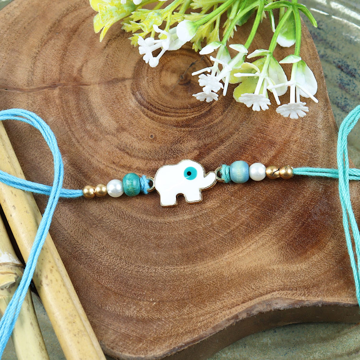 Evil Eye Elephant and Flower Set of 2 Rakhis in Greeting Card with Roli Chawal