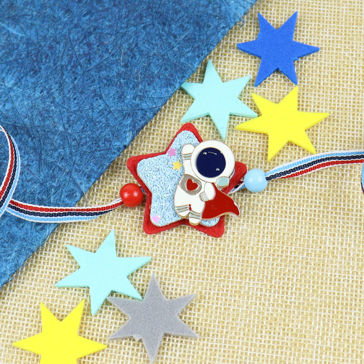 Astronaut Star Rakhi in Greeting Card with Roli Chawal