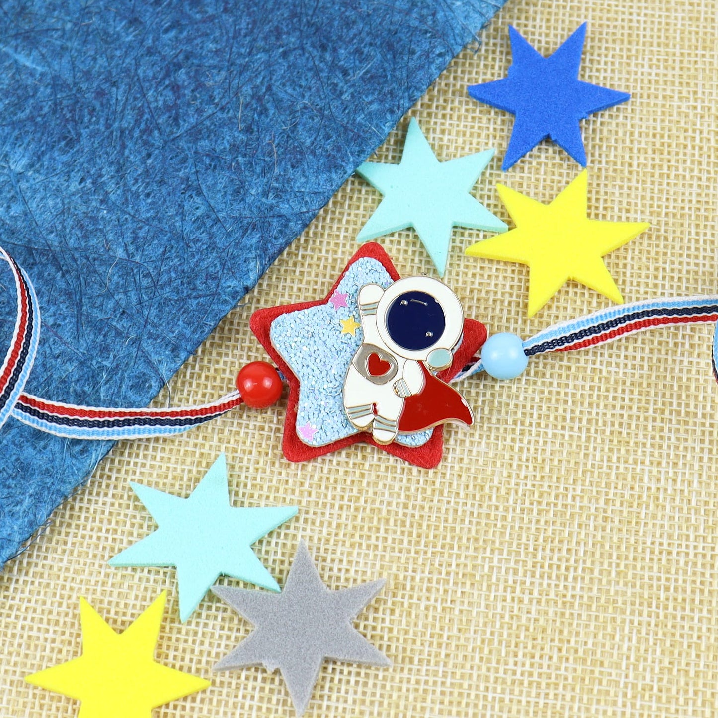 Astronaut Star Rakhi in Greeting Card with Roli Chawal