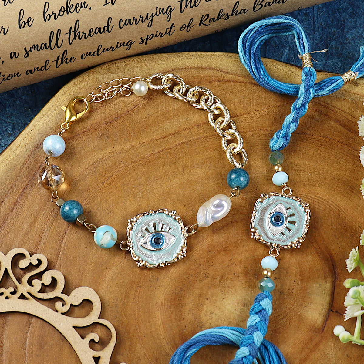 Evil Eye Charm bracelet and Rakhi laid flat — Bhai Bhabhi Rakhi set