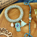 Evil Eye bracelet and Rakhi laid flat — Bhai Bhabhi Rakhi set