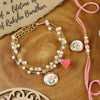 Pearls Floral Charm bracelet and Rakhi laid flat — Bhai Bhabhi Rakhi set
