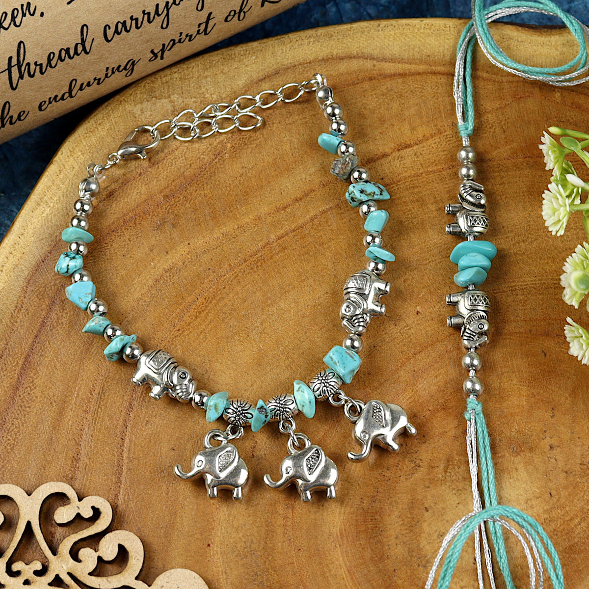 Elephant Charm bracelet and Rakhi laid flat — Bhai Bhabhi Rakhi set