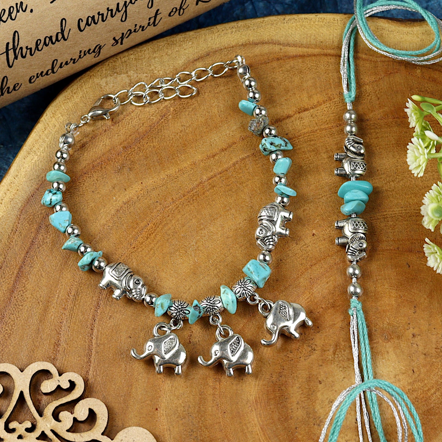 Elephant Charm bracelet and Rakhi laid flat — Bhai Bhabhi Rakhi set