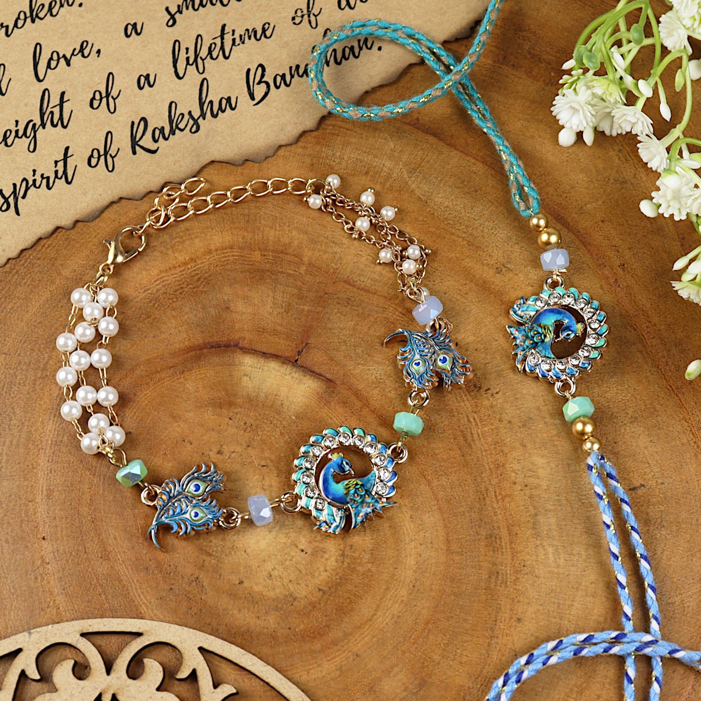 Peacock bracelet and Rakhi laid flat — Bhai Bhabhi Rakhi set