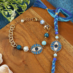 Evil Eye Charm bracelet and Rakhi laid flat — Bhai Bhabhi Rakhi set