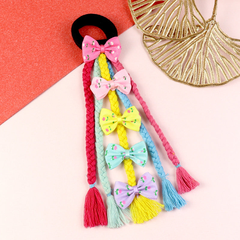 Bow tassel fabric hair tie, laid flat