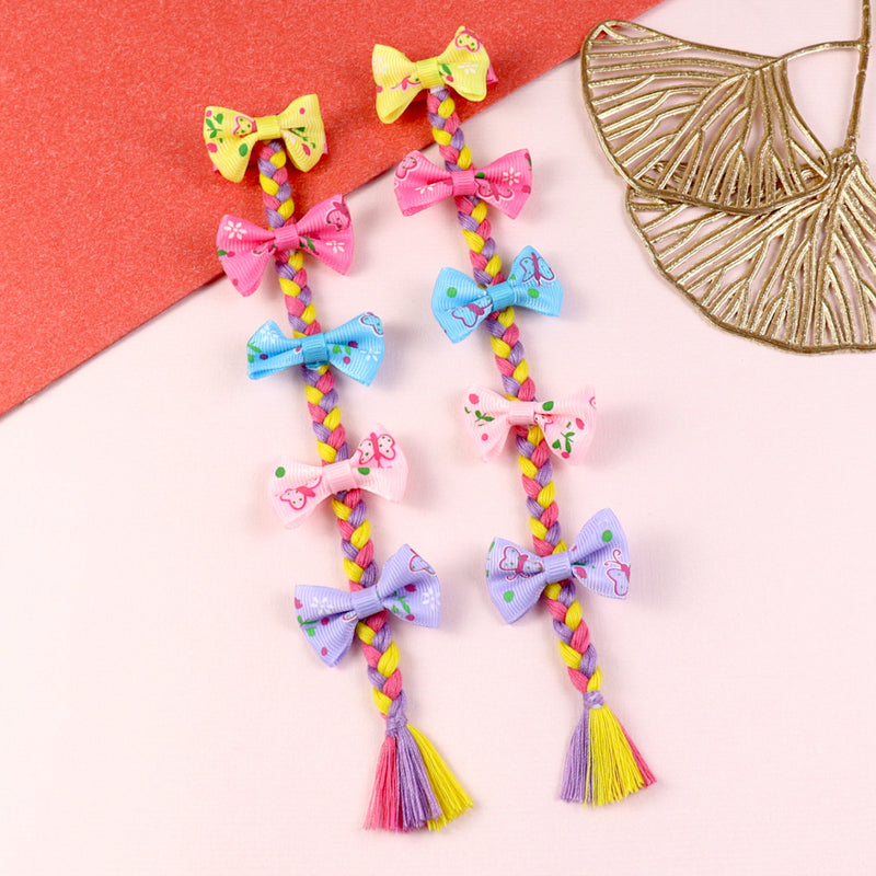 Bow tassel hair clip duo, laid flat