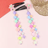 Set of 2 resin charm beaded tassel hair clips, laid flat